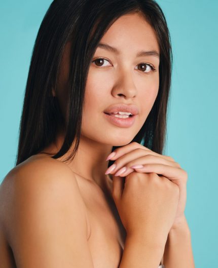 beautiful-asian-brunette-girl-dreamily-looking-in-YHJW725.jpg